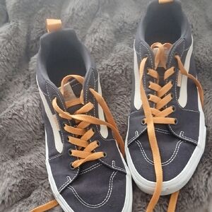 Vans Black and White Sneakers with Orange Laces